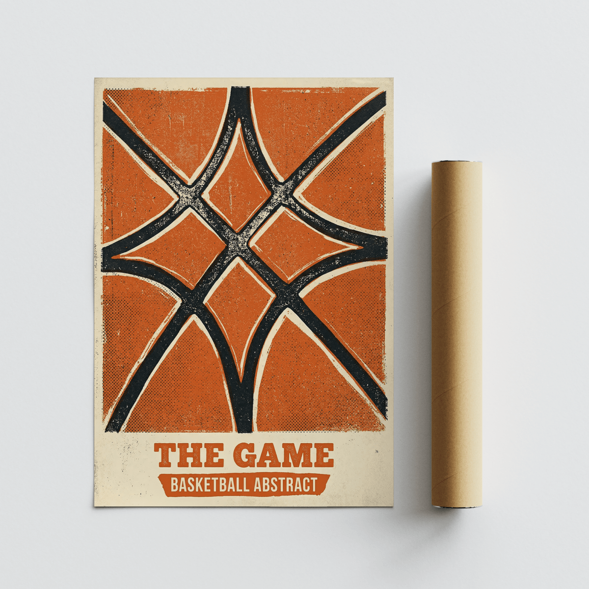 Abstract basketball design print with orange and black colours next to a brown packaging tube