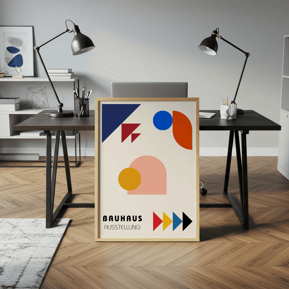 Abstract Geometric Art print leaning on a wooden floor in an office with black desk lamps and shelves