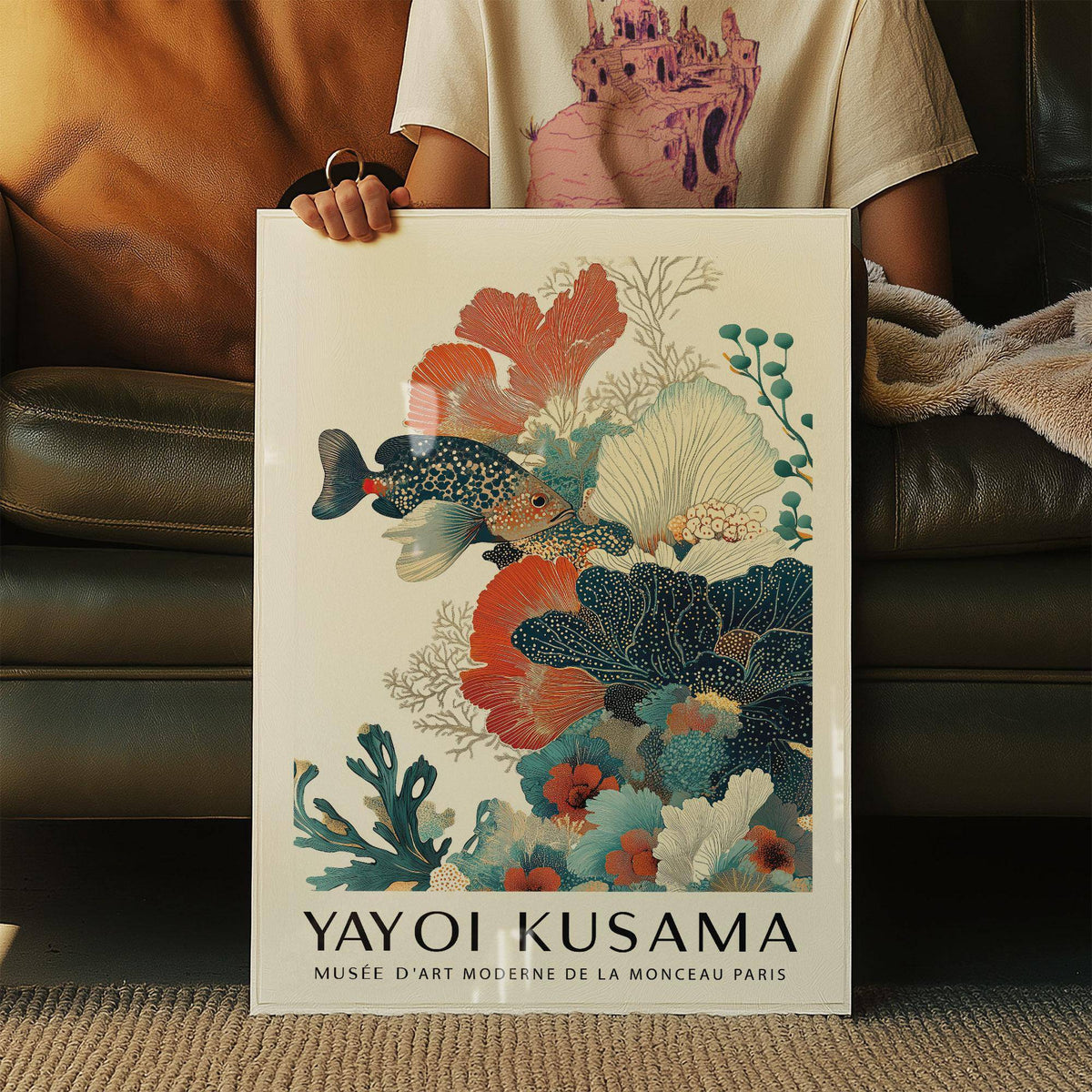 Framed close-up of a tropical fish poster showing reef fish and coral in orange, blue and cream tones