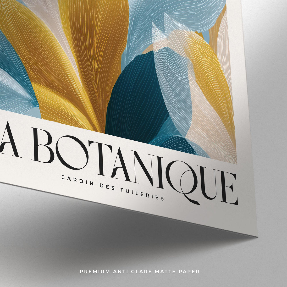 Detail close-up of Wall Art Blue and Gold showing abstract botanical leaves and text on matte paper