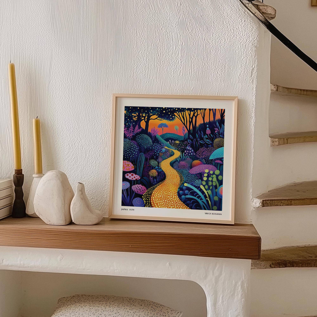 Print leaning on a shelf of Polka Dot Pop Art showing a golden forest path with purple and pink foliage near candles