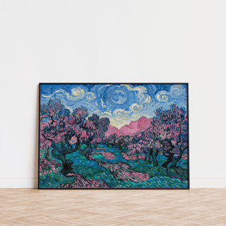 Colorful Landscape Art floral abstract with pink and blue hues leaning on a wooden floor