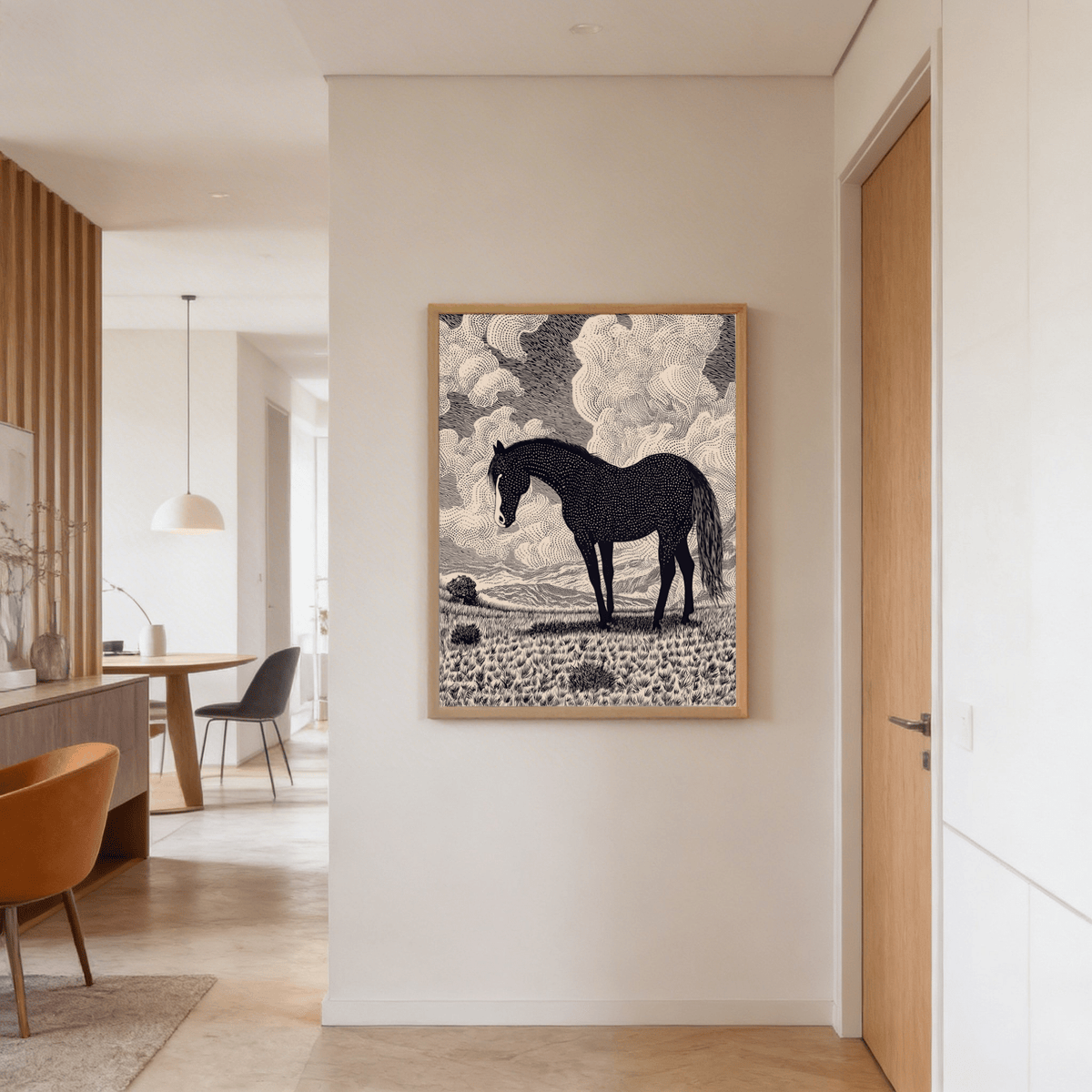 Black Horse Art Print framed on a cream wall in a hallway with wooden door nearby