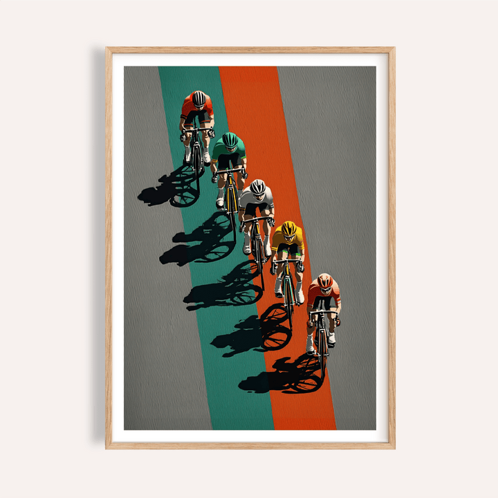 Framed close-up of biking wall art showing cyclists in coloured jerseys on grey and orange background