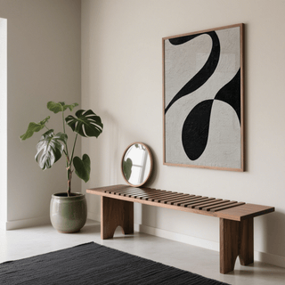 Abstract Black and White Art print with black organic shapes above a wooden bench and a potted plant