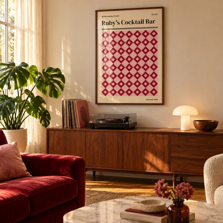 Cardiff Print, framed on the wall of a warm living room with soft golden light through a sheer curtain