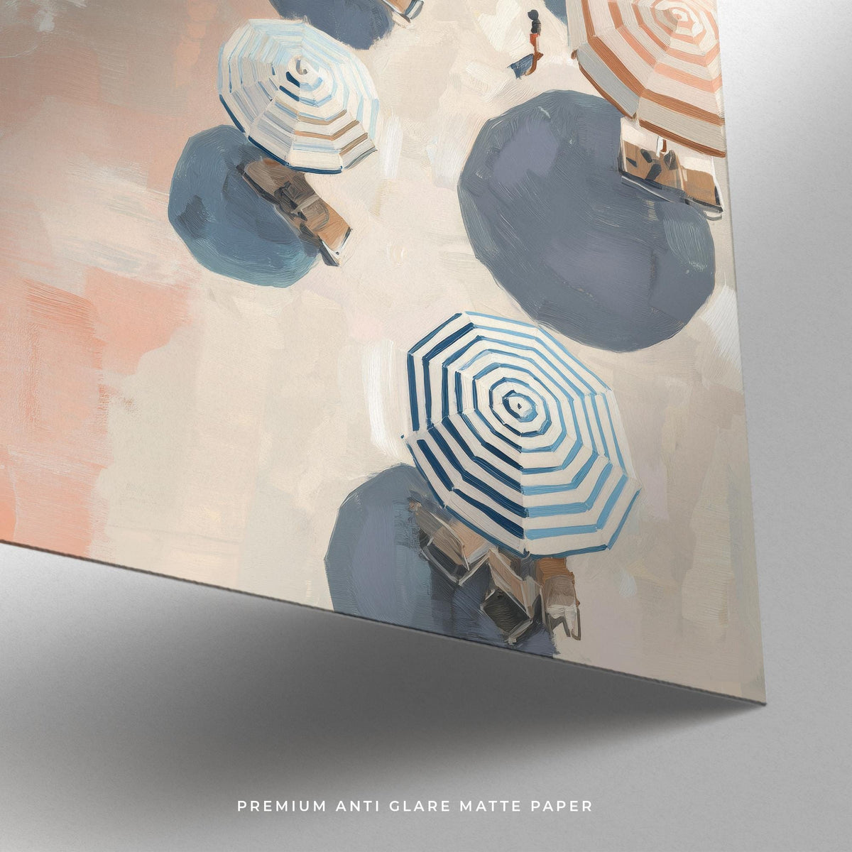 Print close-up of beach umbrella print showing blue and beige striped umbrellas on matte paper