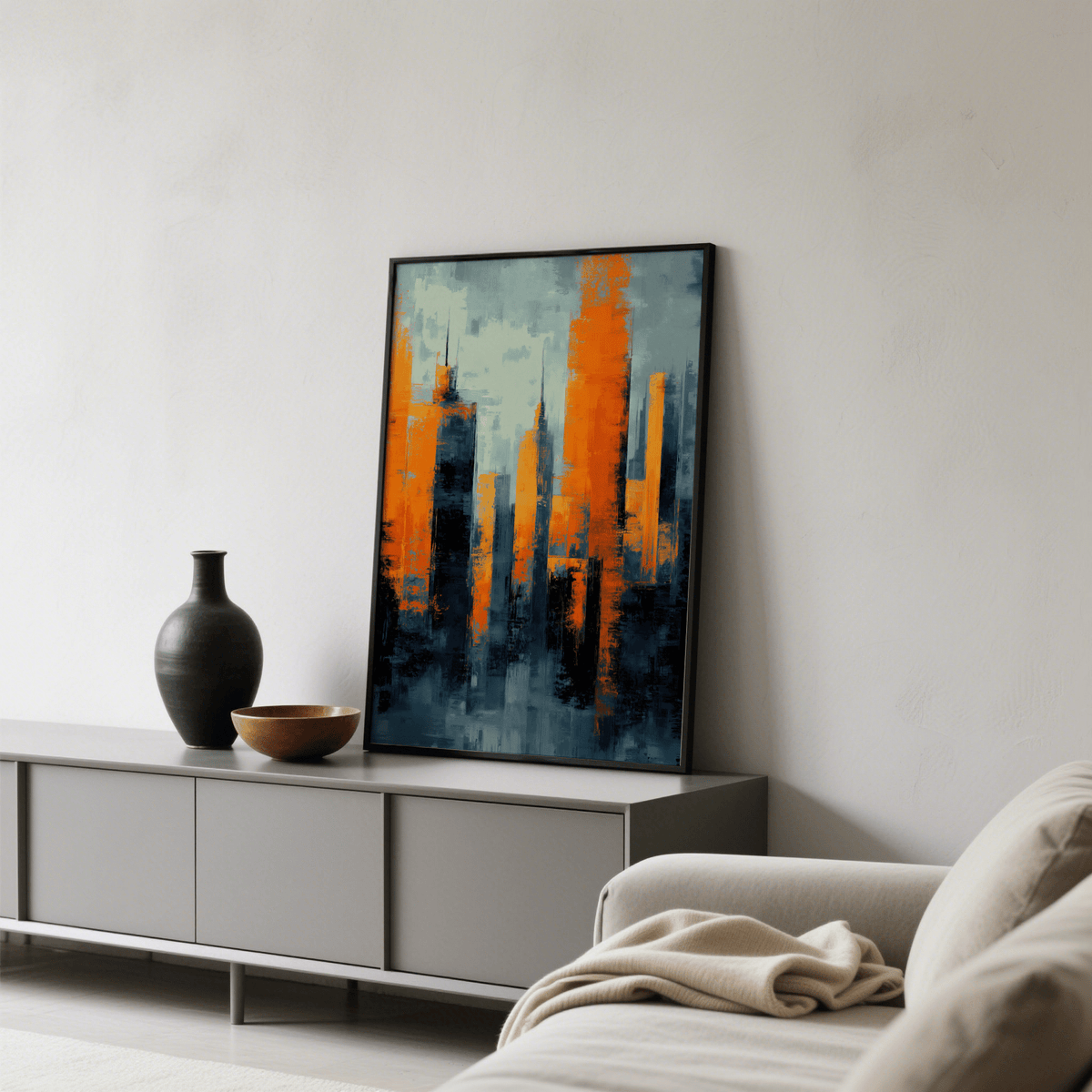 Contemporary Urban Art print leaning on a cabinet with decorative vases nearby in a living room