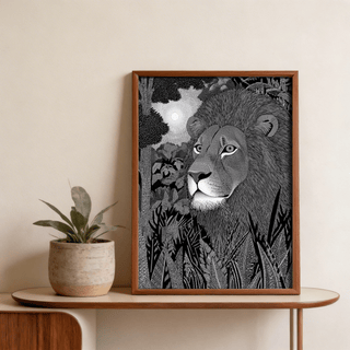 Framed Black Lion wall art of a lion with detailed mane in black and grey tones next to a potted plant