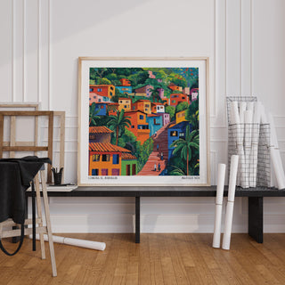 Comuna 13 Art print leaning on a black table with wooden floor and white wall panels
