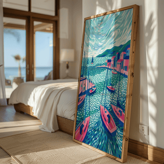 Sailboats wall art leaning in a sunlit bedroom with a bed and soft bedding nearby