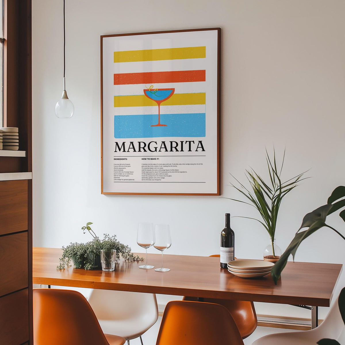 Margarita wall art with yellow orange and blue stripes above a dining table with glasses and plant
