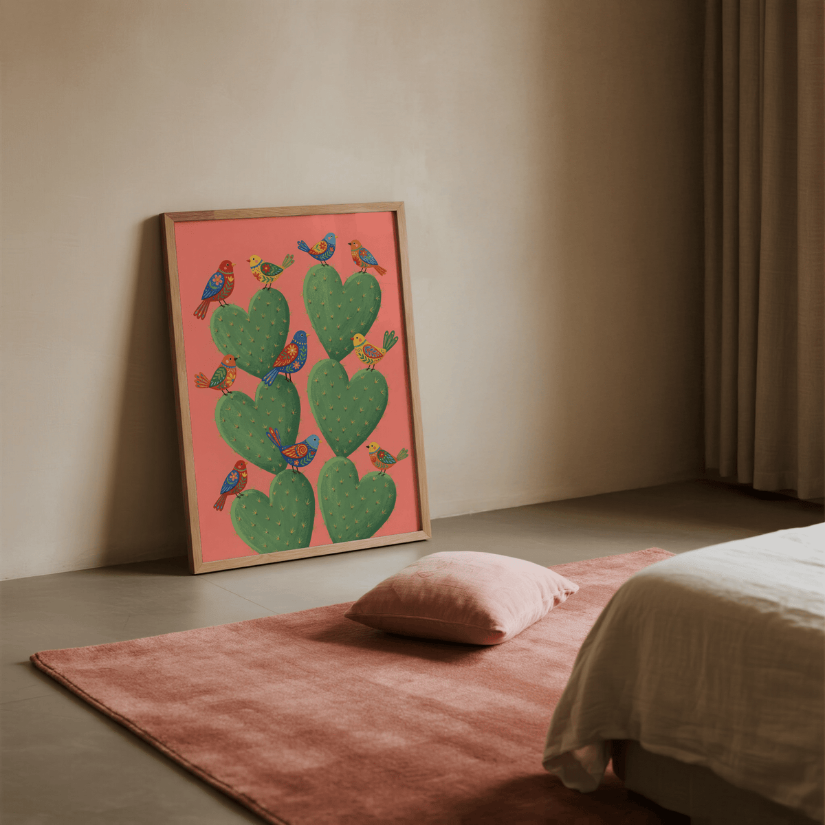 Cactus Heart Poster print leaning on the floor with heart-shaped green cacti and colourful birds in a bedroom