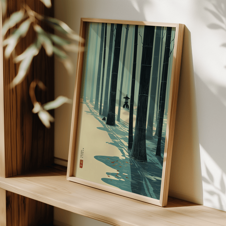 Print leaning on a shelf with Japanese bamboo wall art depicting a blue and cream minimalist bamboo forest with shadows