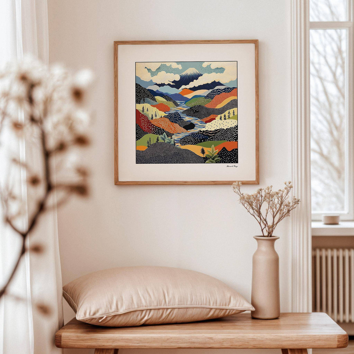 Japanese art prints framed print of abstract Mount Fuji landscape with muted colours above a cushion on a wooden table
