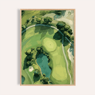 Framed print of an aerial golf landscape poster showing green course with trees and water