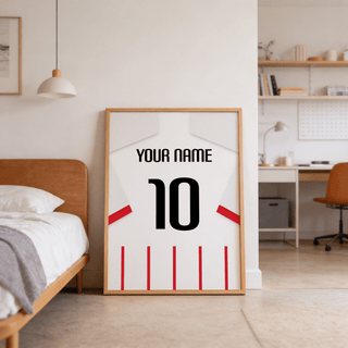 Football Shirt Poster in Red and White Stripes with White Sleeves leaning on the floor in a bedroom with wooden bed and desk