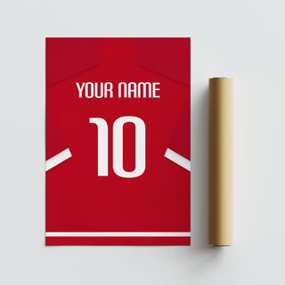 Football Shirt Poster in Red with White Sleeve Stripes next to a brown packaging tube on a white surface