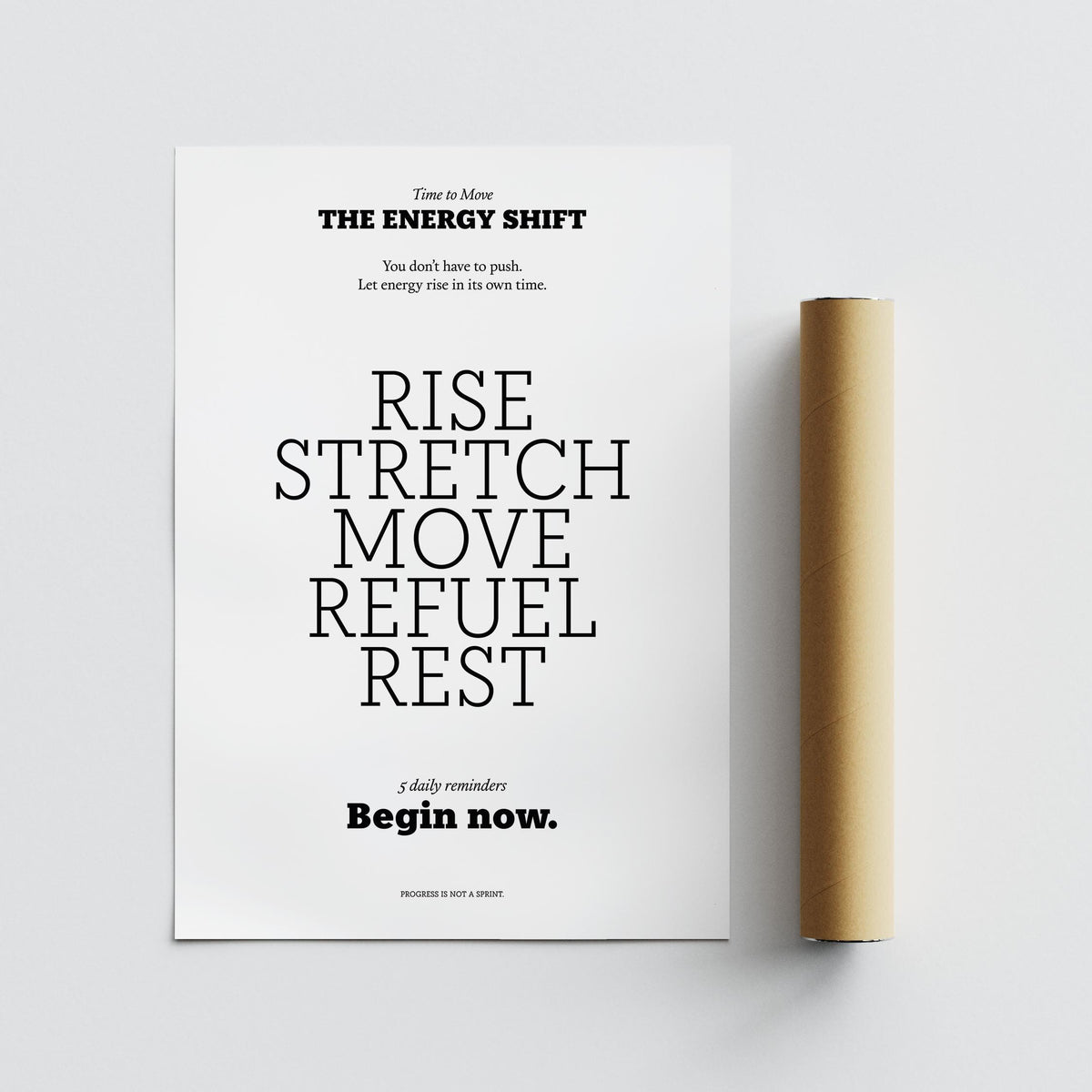Posters with Inspirational Sayings typographic print with black text on white background beside brown packaging tube