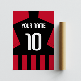 Close-up of football shirt poster in black and red stripes lying next to a packaging tube