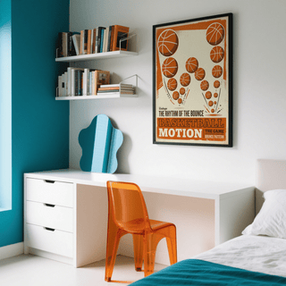 Vintage Basketball Motion Art on a wall above a desk with an orange transparent chair in a bedroom
