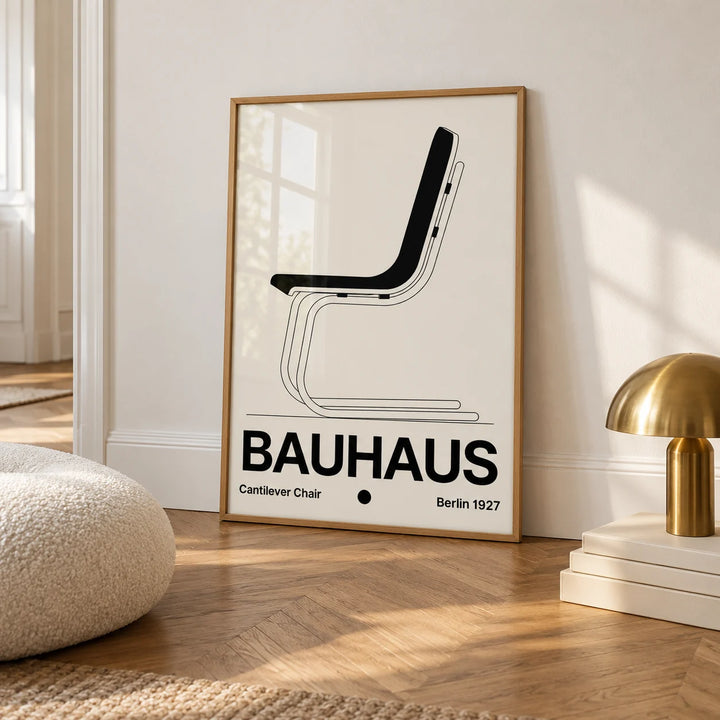 Chair Poster, framed on the wall of a calm white room with a white skirting board and herringbone oak parquet