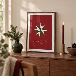 Christmas Star Print, a small A4 framed print leaning on a walnut sideboard in a living room
