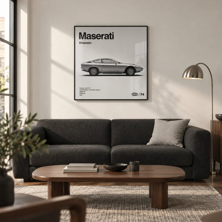 Classic 1970s Grand Tourer Poster, framed on the wall of a design-led living room in a UK city flat with a soft white wall