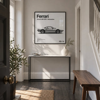 Classic 1970s Italian Sports Car Poster, framed on the wall of a bright hallway in a renovated UK townhouse with pale grey walls and a dark timber floor