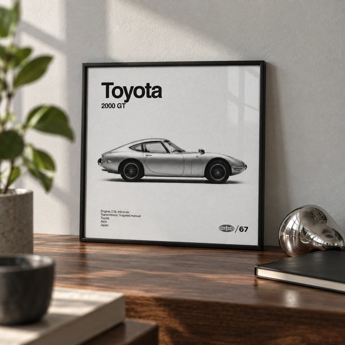 Classic Japanese Sports Car Poster, a small A4 framed print leaning on a walnut desk
