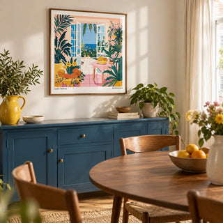 Coastal Wall Art, framed on the wall of a characterful dining room in a UK flat with warm white walls and a solid blue painted sideboard