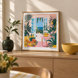 Coastal Wall Art, a small A4 framed print leaning on a pale oak sideboard in a living room