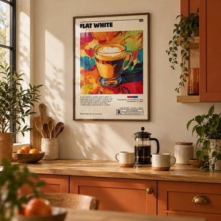 Coffee Shop Wall Art, framed on the wall of a warm kitchen with burnt orange cabinets