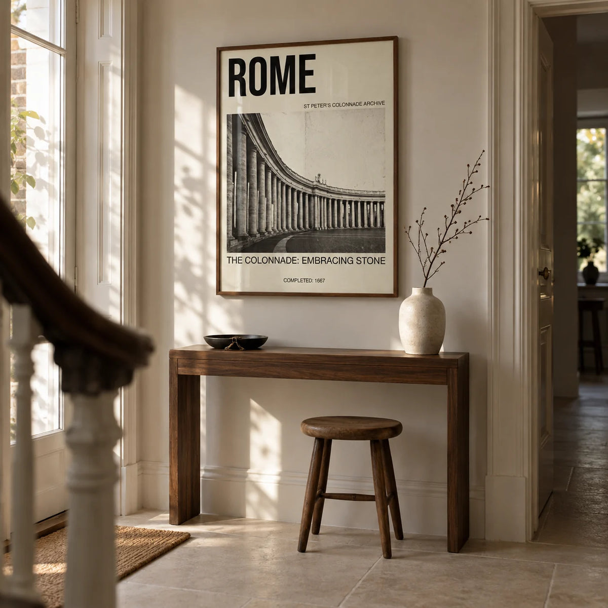 Colonnade Architecture Art Print, framed on the wall of a carefully renovated Victorian terrace hallway with pale stone walls and a plain limestone floor