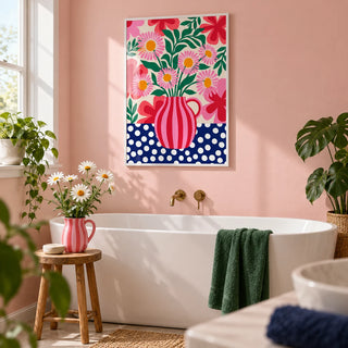 Colorful Flower Art Print, framed on the wall of a bright bathroom with a soft pink painted wall