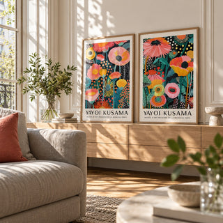 Colourful Floral Prints Set of 2 styled on a pale wooden console under a sunny window: Petal Paradise and Botanical Glow shown framed side by side (frames not included)