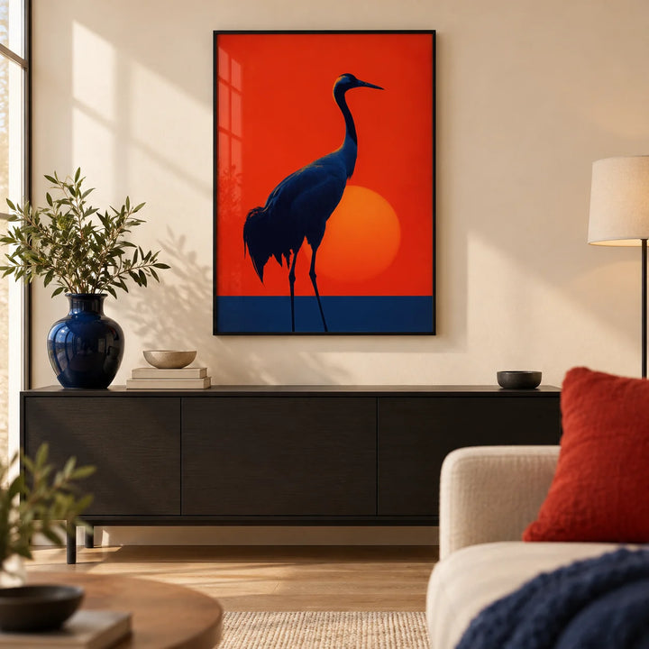 Cranes Silhouette Art Print, framed on the wall of a calm modern living room with a warm white wall and a pale oak floor