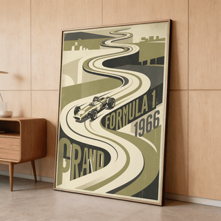 Vintage Grand Prix Car Poster leaning on a floor against a wooden wall with a wooden cabinet nearby