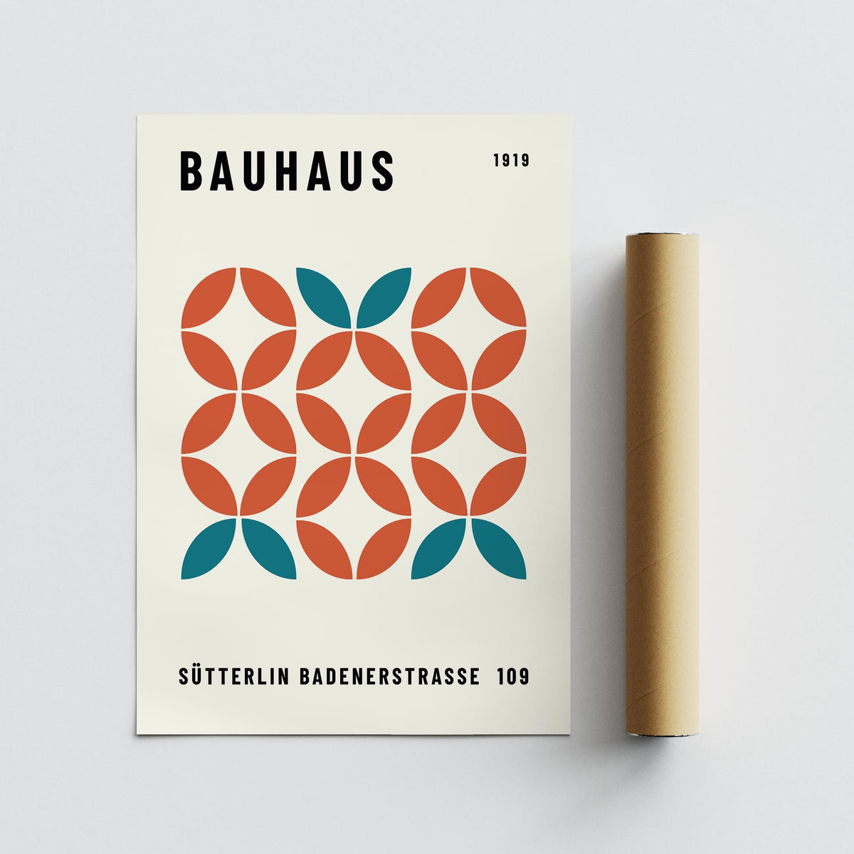 Modern Geometric Wall Art with teal and orange circular shapes alongside a brown packaging tube