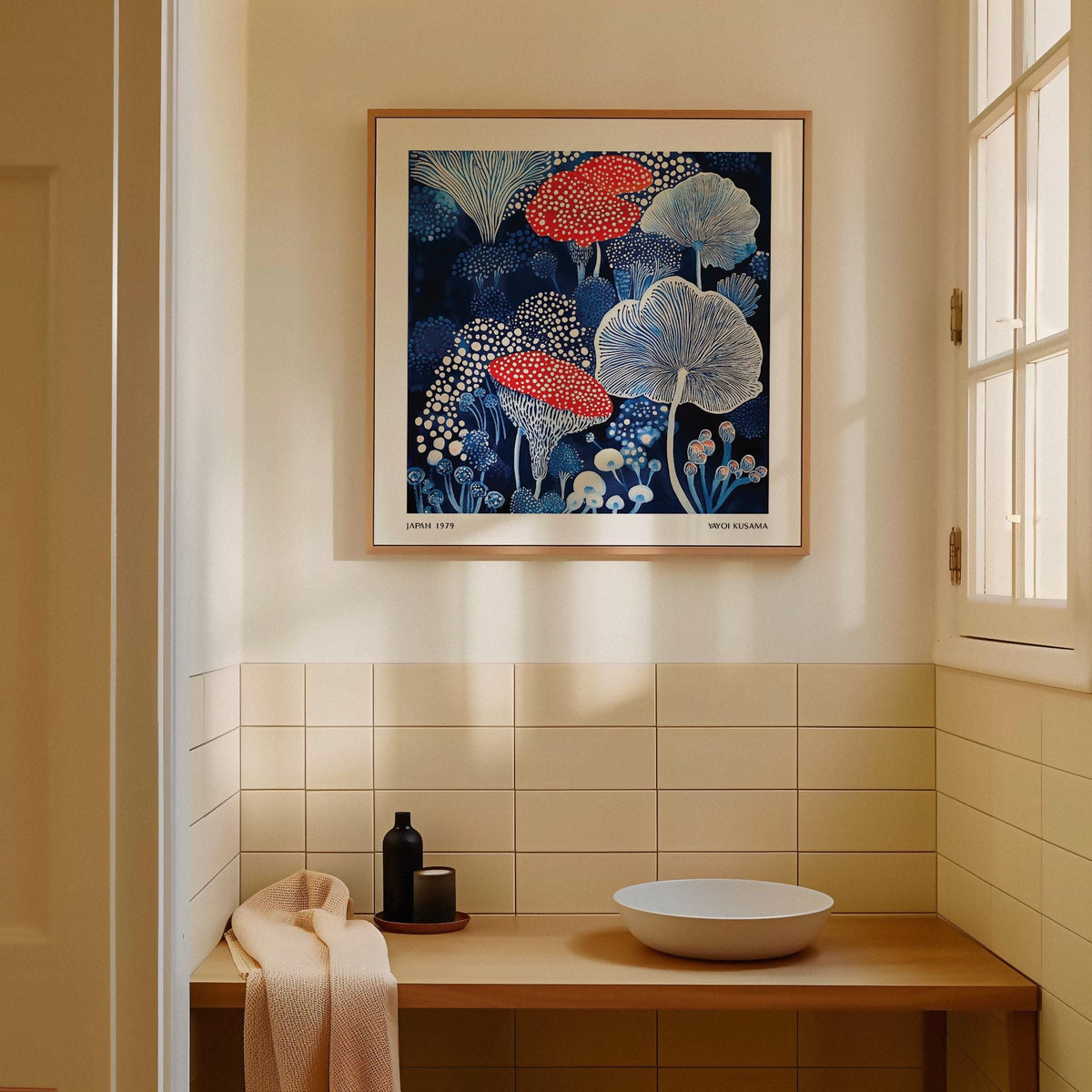 Mushroom Poster print of spotted mushrooms in red and blue hues hanging on a tiled wall with a bowl and bottle on a wooden surface