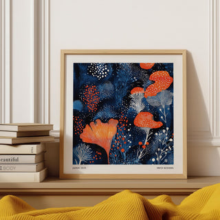 Unique Living Room Wall Art abstract floral shapes in blue and orange framed print close-up on a shelf with books