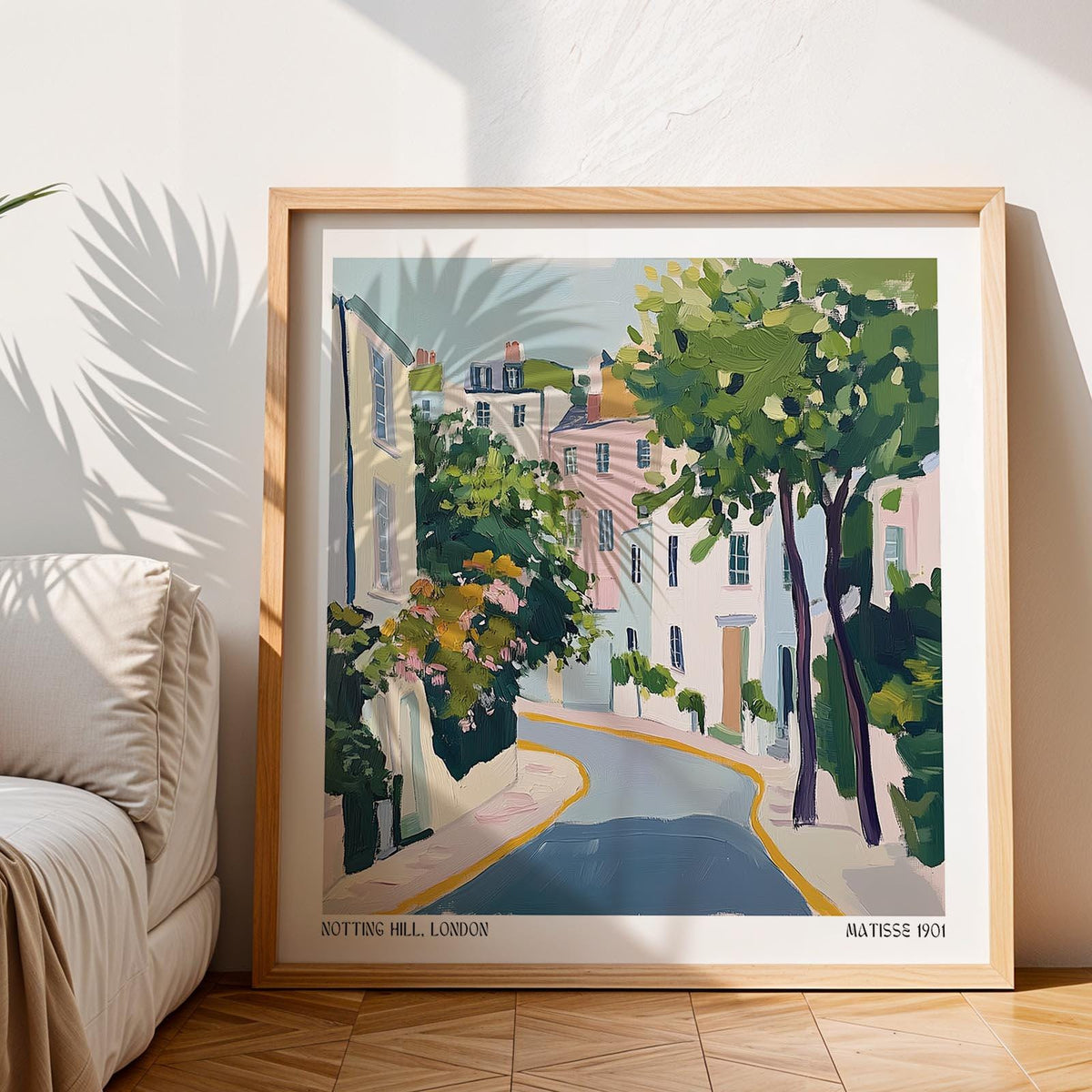 Framed Notting Hill poster illustrating a street scene with green trees and pastel buildings
