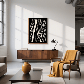 Art Black White Abstract print on a white wall above a wooden sideboard in a sunlit room