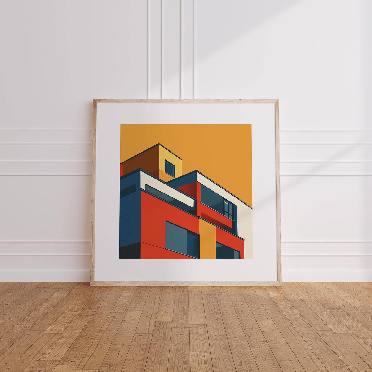 Modernist Architecture print leaning on a wooden floor showing a minimalist contemporary building in bold colours