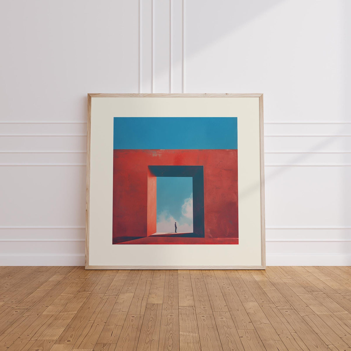 Framed Abstract Surrealism Art showing a person in a red geometric passage with blue sky background leaning on a wooden floor