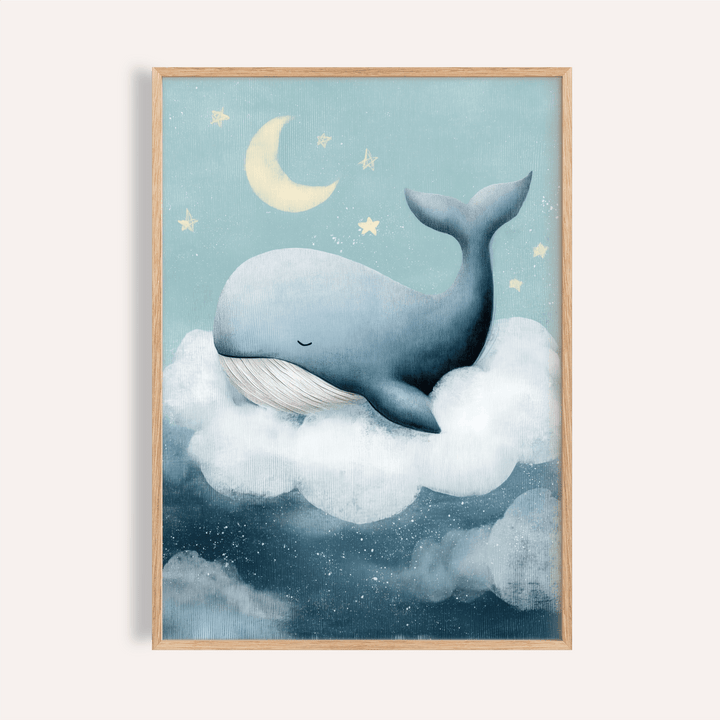 Framed Whale Nursery Wall Art with a sleeping whale on a white cloud under a crescent moon