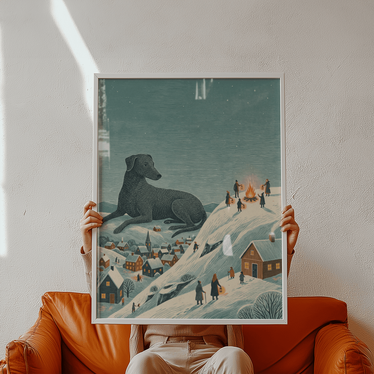 Winter Landscape wall art held up showing a large black dog figurine and folk-art style village scene