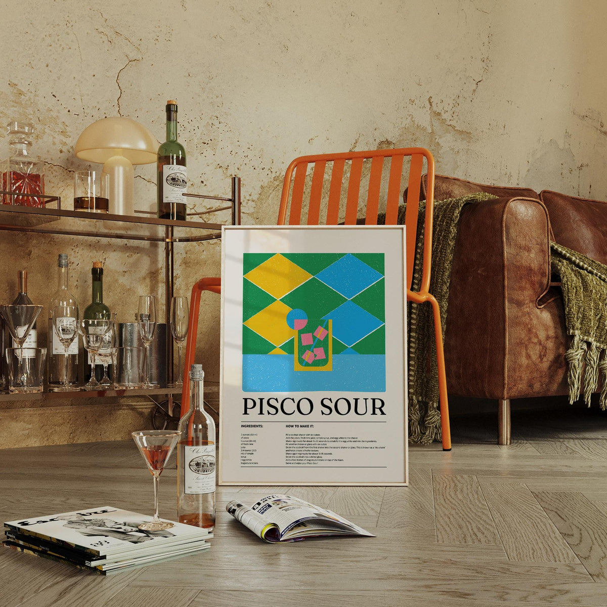 Colorful Posters print leaning on floor with green and brown wall and chair nearby