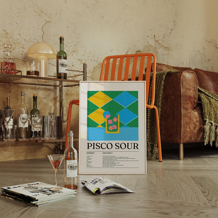 Colorful Posters print leaning on floor with green and brown wall and chair nearby