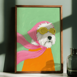 Framed print of a dog with aviator goggles and pink scarf in bright colours next to a glass vase